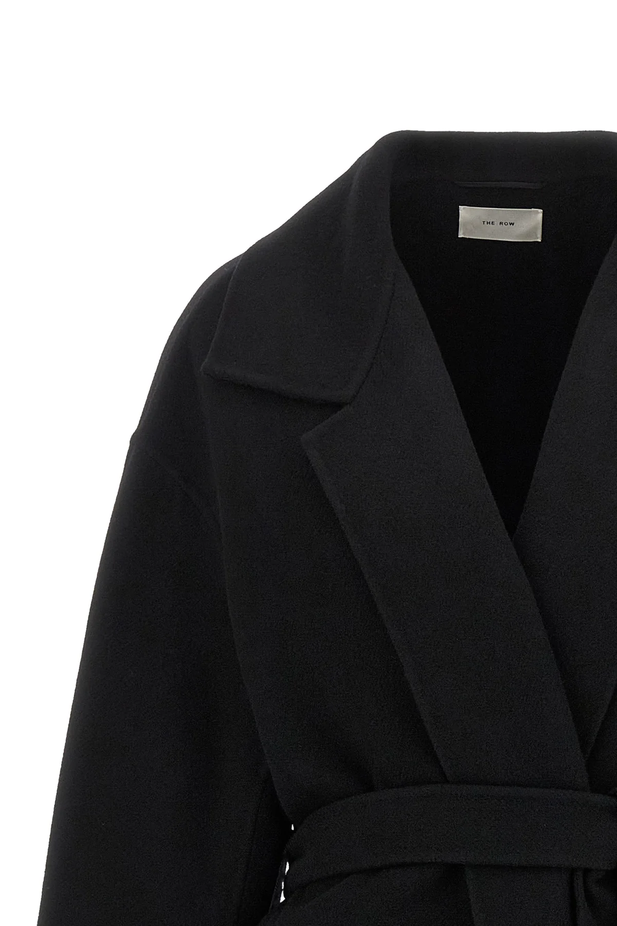 the row ciara coat redefines winter elegance through relaxed volumes and impecca
