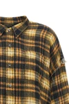 the r13 shirt redefines the codes of the casual wardrobe through a grunge and de