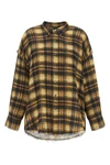 the r13 shirt redefines the codes of the casual wardrobe through a grunge and de