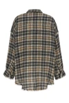 the r13 shirt redefines casual tailoring through a deconstructed aesthetic