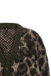 the cardigan r13 defines a relaxed silhouette through wide volumes and dropped s