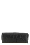 the rick owens baguette clutch defines avant-garde minimalism through an elong