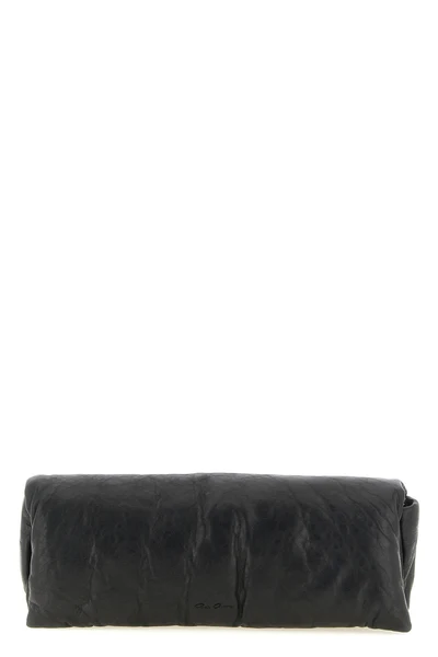 the rick owens baguette clutch defines avant-garde minimalism through an elong