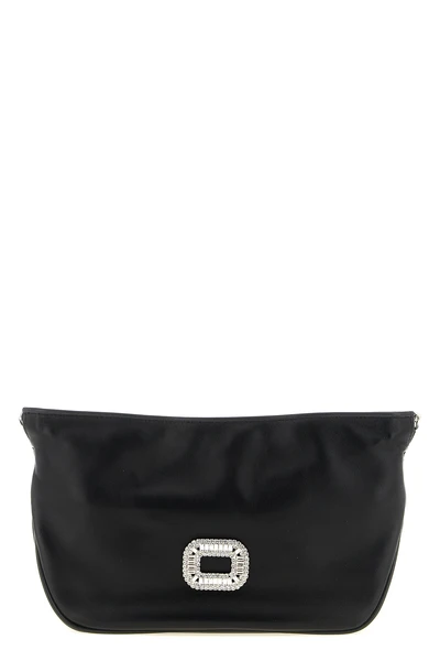 the roger vivier pilgrim micro clutch bag in soft black lambskin stands out fo