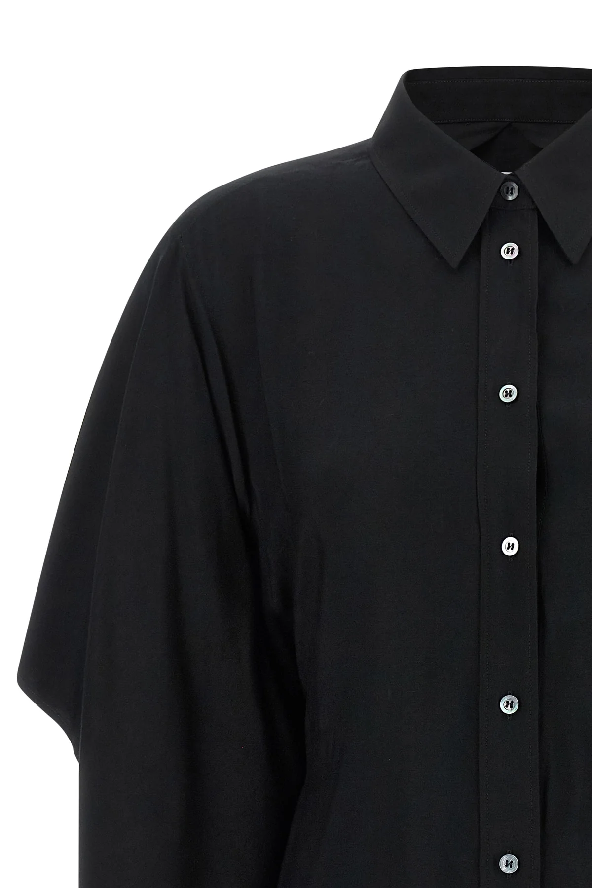 the maison margiela shirt redefines the codes of classic tailoring through a hyb