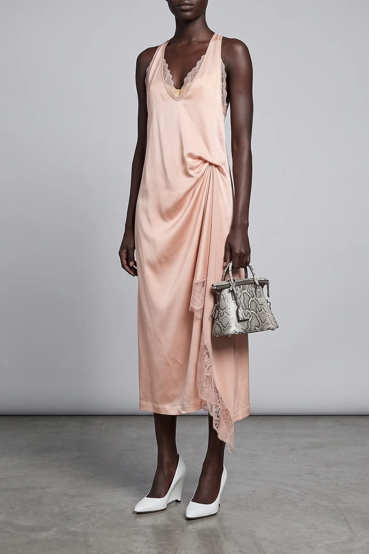 the maison margiela silk lace slip midi dress redefines the codes of deconstruct