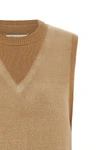 the maison margiela memory of knitted vest features a complex trompe loeil co