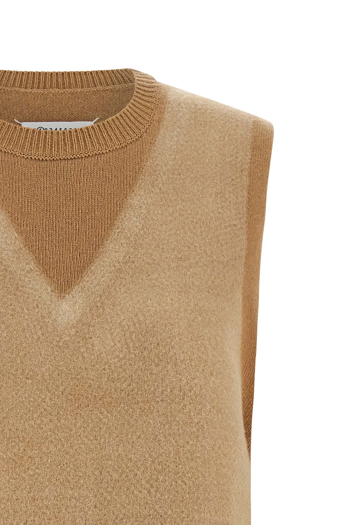 the maison margiela memory of knitted vest features a complex trompe loeil co