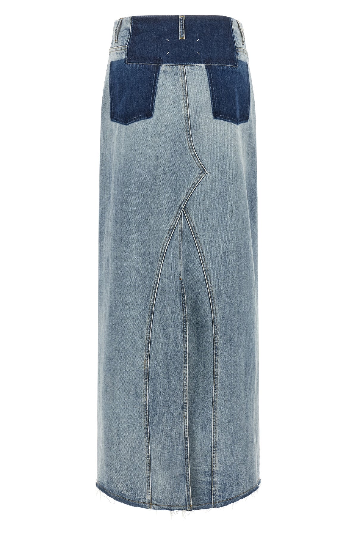 maison margiela long skirt redefines denim codes through a two-tone deconstructe