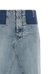maison margiela long skirt redefines denim codes through a two-tone deconstructe