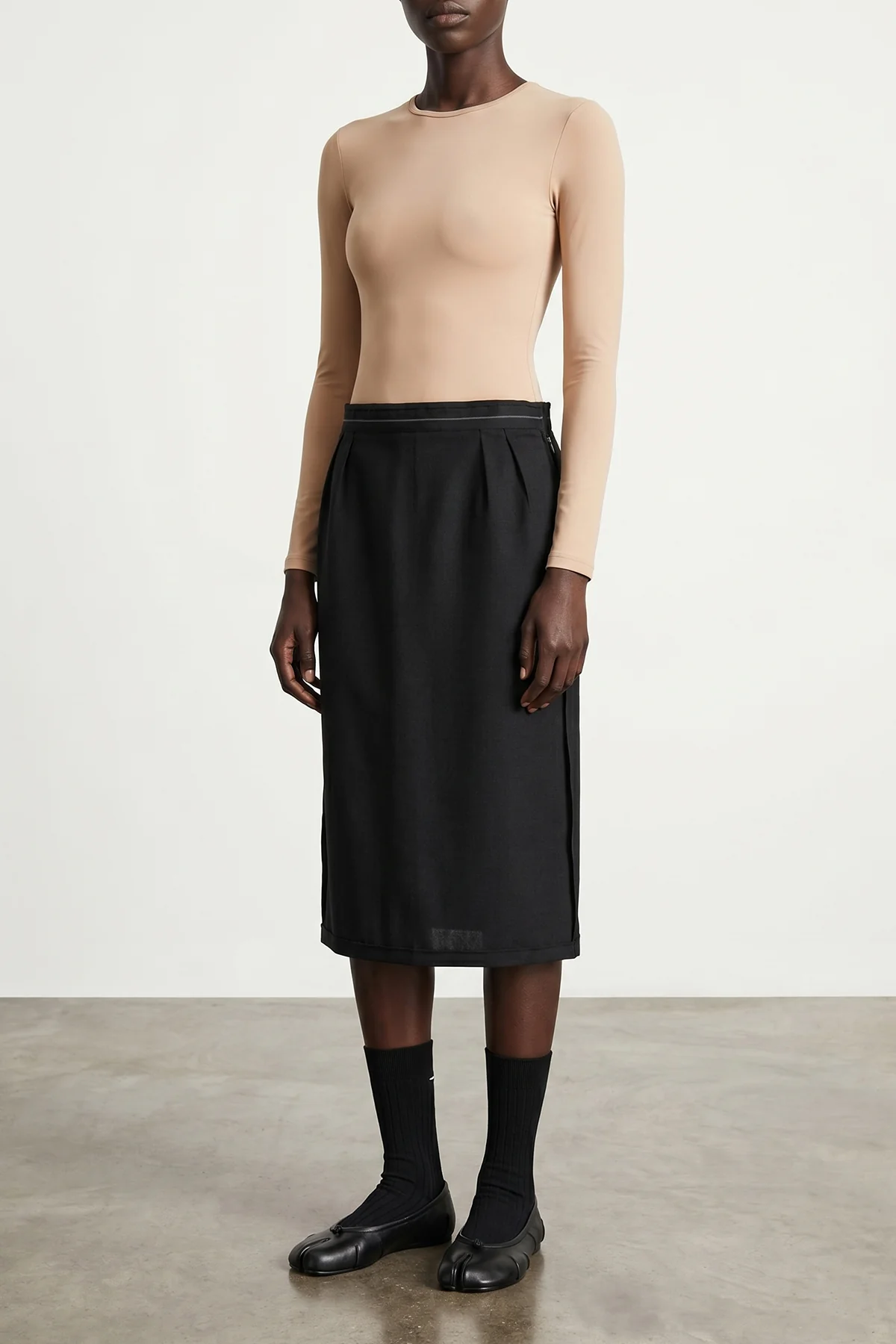 maison margielas black wool blend socks redefine the daily accessory through th