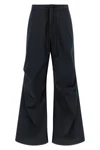 maison margiela mm6 trousers redefine the volumes of everyday wardrobe through a