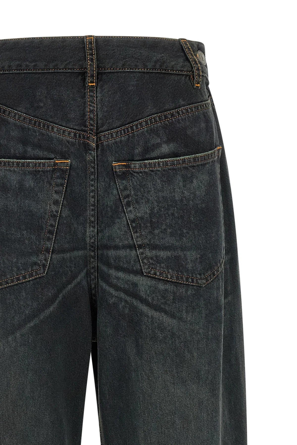 mm6 maison margielas wide-leg jeans redefine classic denim through an asymmetri