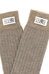 maison margiela mm6 socks redefine the essentiality of everyday wardrobe through