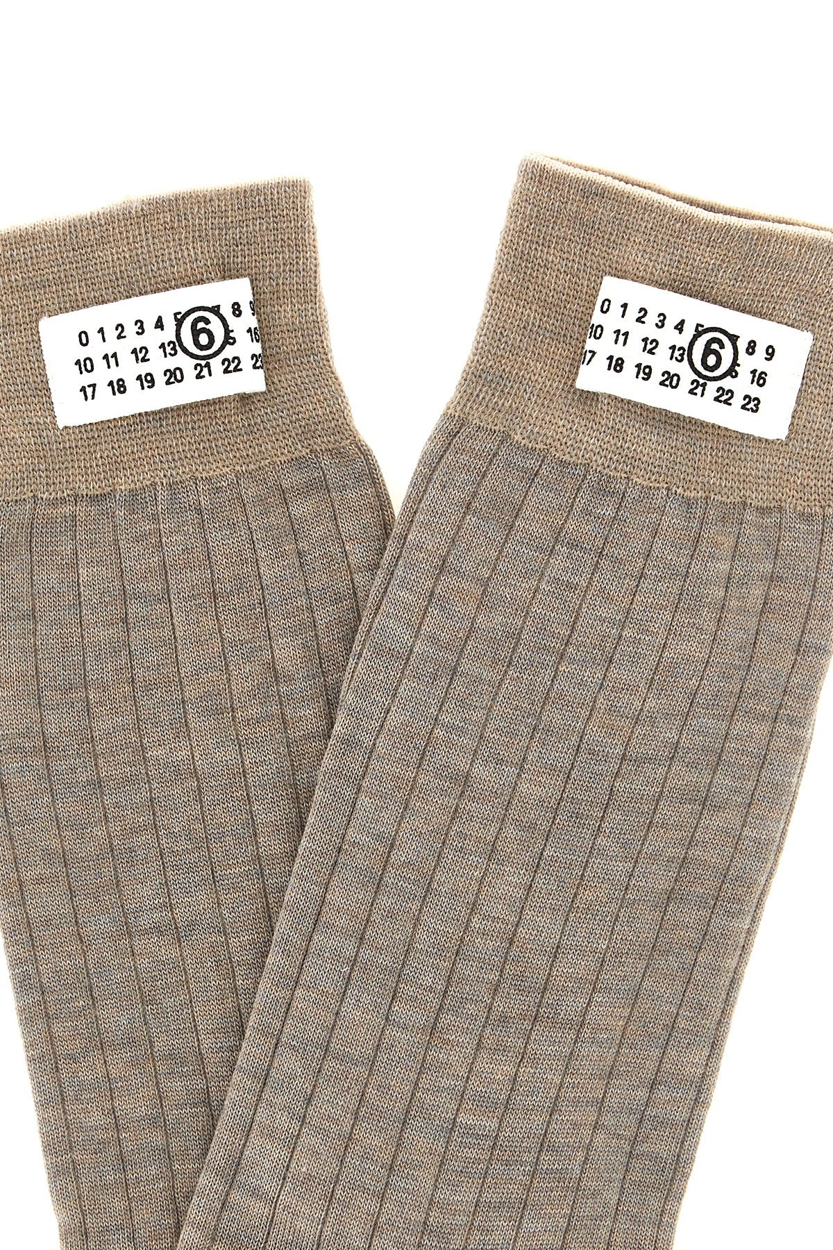 maison margiela mm6 socks redefine the essentiality of everyday wardrobe through