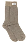 maison margiela mm6 socks redefine the essentiality of everyday wardrobe through