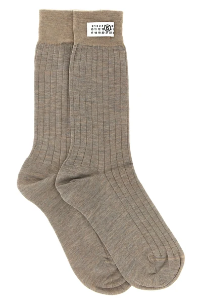 maison margiela mm6 socks redefine the essentiality of everyday wardrobe through