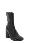 the mm6 maison margiela ankle boot redefines contemporary footwear through a rig