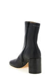 the mm6 maison margiela ankle boot redefines contemporary footwear through a rig