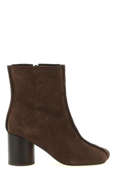 maison margielas mm6 stitch-toe ankle boots define contemporary footwear throug