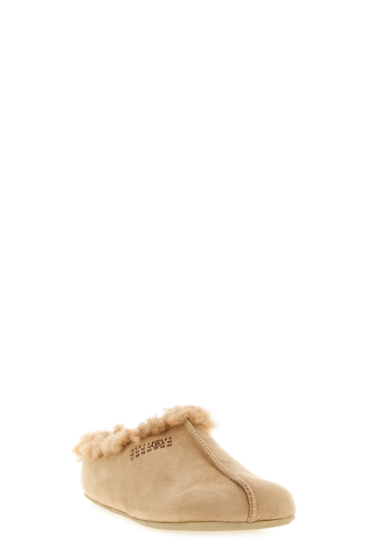 the maison margiela mm6 sabot redefines the concept of slip-on footwear through