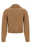 the maison margiela mm6 cardigan redefines knitwear codes through a cropped silh