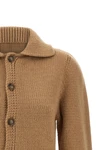the maison margiela mm6 cardigan redefines knitwear codes through a cropped silh