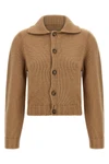 the maison margiela mm6 cardigan redefines knitwear codes through a cropped silh