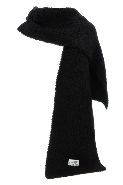 the maison margiela mm6 scarf is distinguished by an elongated rectangular const