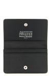 the maison margiela cardholder redefines small leather goods through a minimal a
