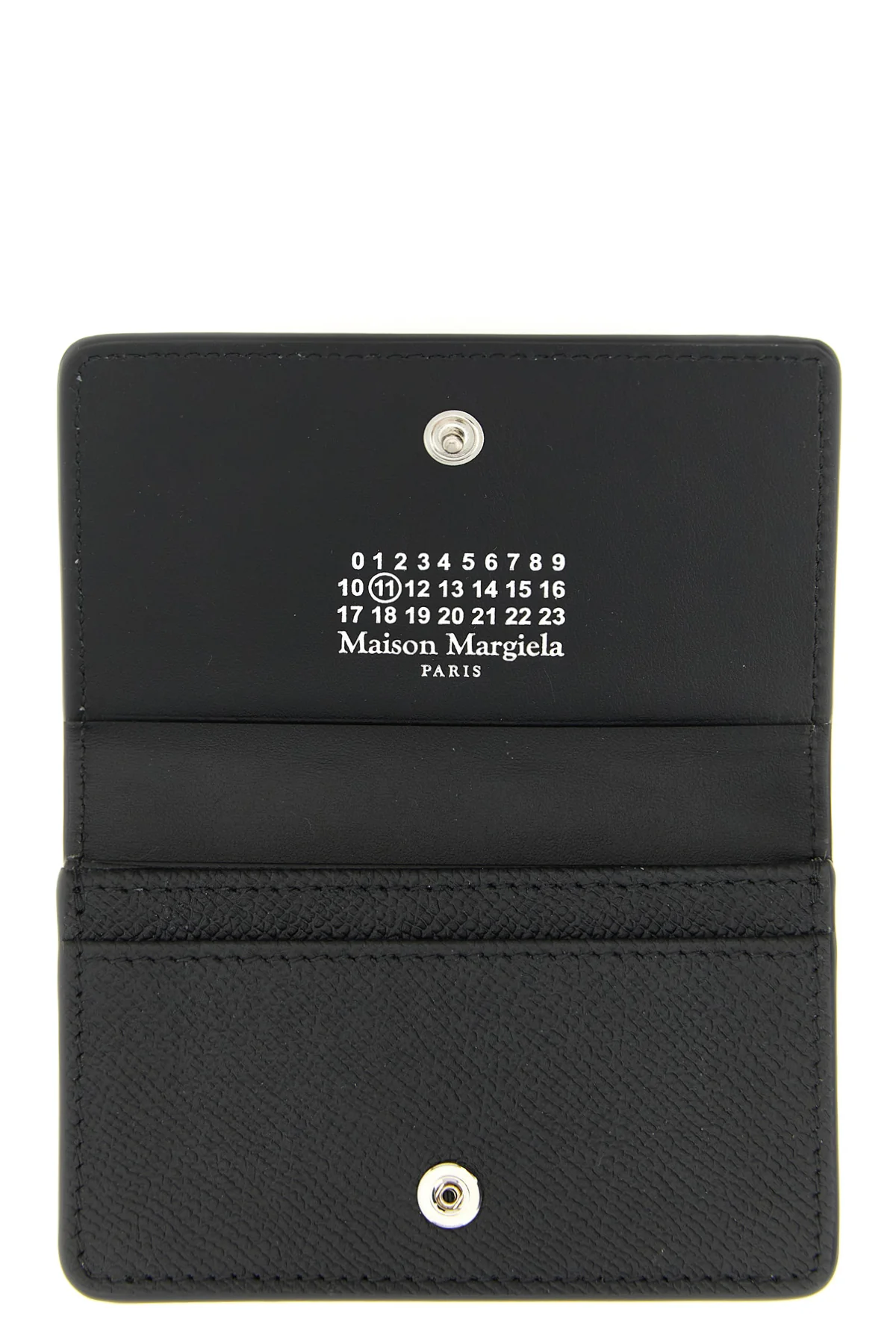 the maison margiela cardholder redefines small leather goods through a minimal a