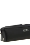 the maison margiela mm6 clutch redefines the codes of everyday accessories throu