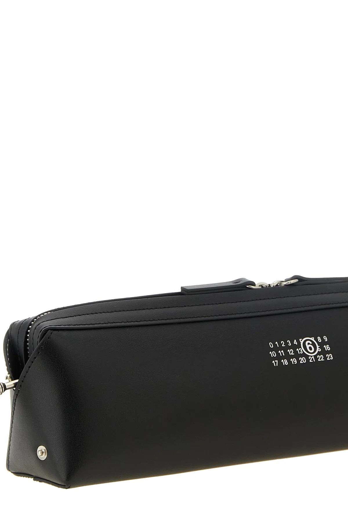 the maison margiela mm6 clutch redefines the codes of everyday accessories throu