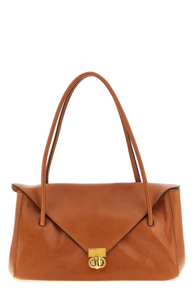 the marni east/west shoulder bag redefines the codes of everyday elegance throug