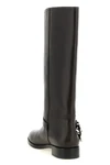 chevalpinko high boots define the silhouette through a rigorous construction in