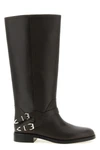 chevalpinko high boots define the silhouette through a rigorous construction in