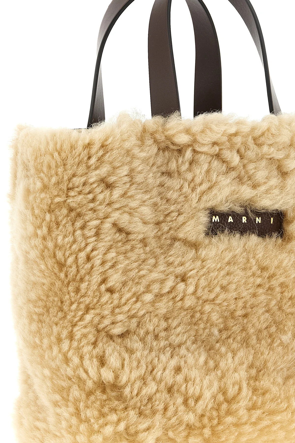 the marni museo soft mini montone handbag redefines everyday volumes through a p