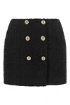 the balmain mini skirt in bouclé cotton blend redefines the codes of contemporar