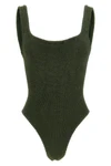 the hunza g square neck one-piece swimsuit defines the silhouette through minima
