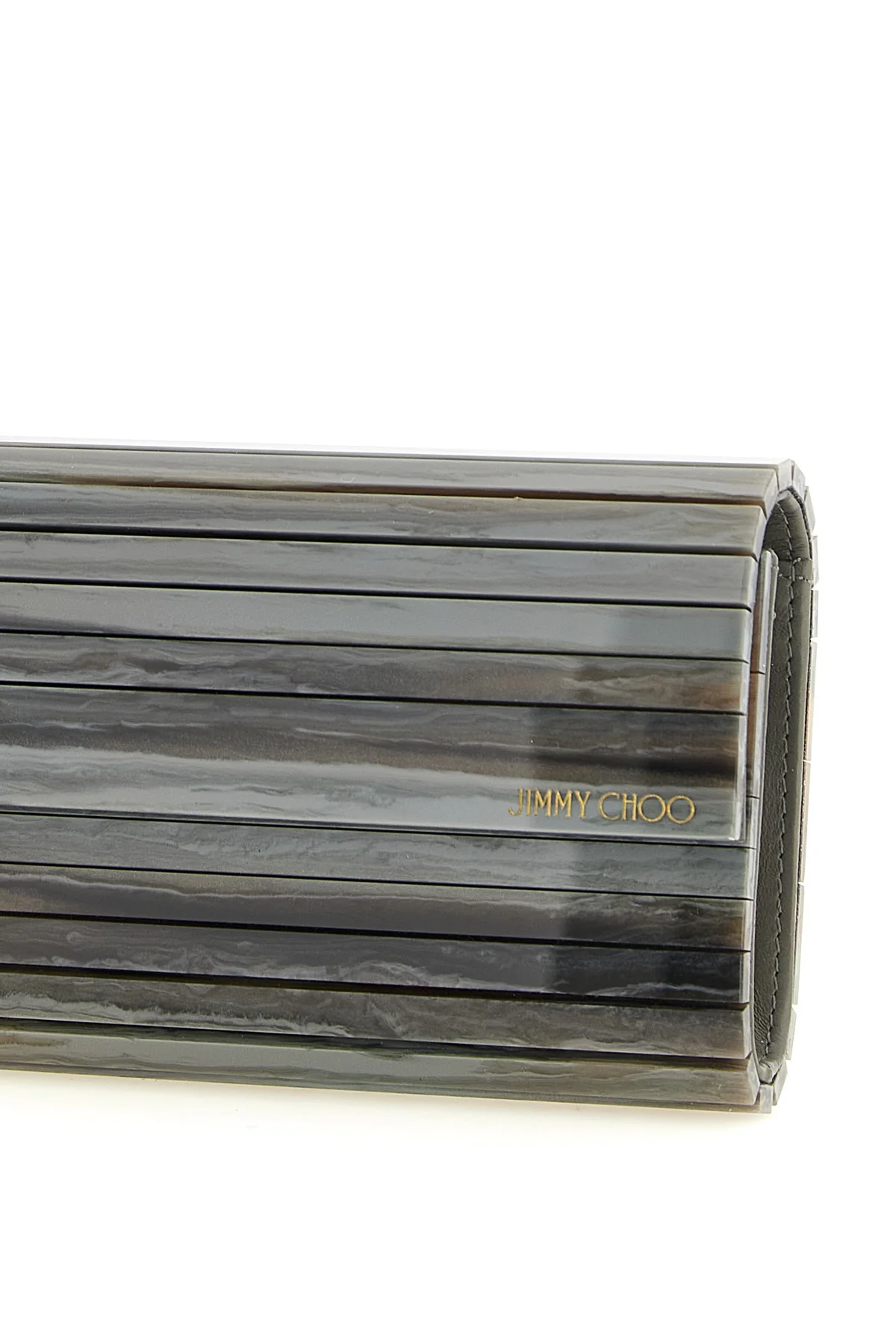 the jimmy choo sweetie clutch has a rigid and elongated silhouette