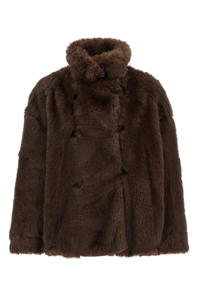 thelatest emma faux fur redefines the codes of winter outerwear through envelo