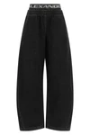 alexander wang denim pants redefine casual wear through a hybrid construction in