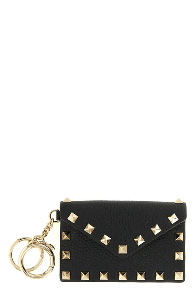 the valentino garavani charm black hammered calf leather card holder defines the