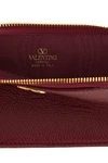 the valentino garavani coin purse and card holder sets a new standard of functio