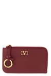 the valentino garavani coin purse and card holder sets a new standard of functio