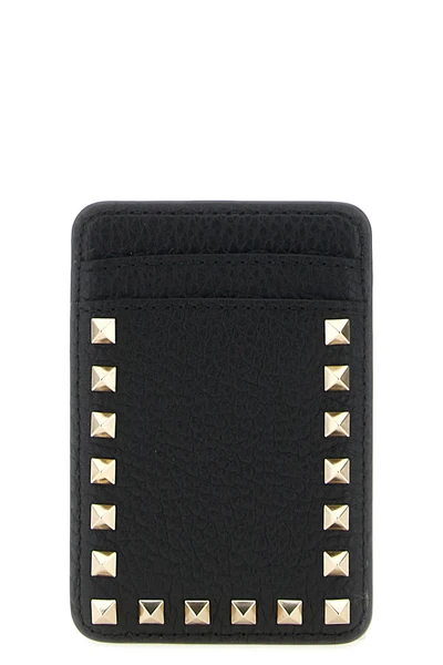 the valentino garavani magnetic card holder exemplifies functional luxury throug