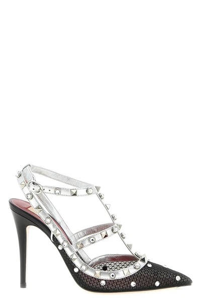rockstud pumps in lace and laminated leather