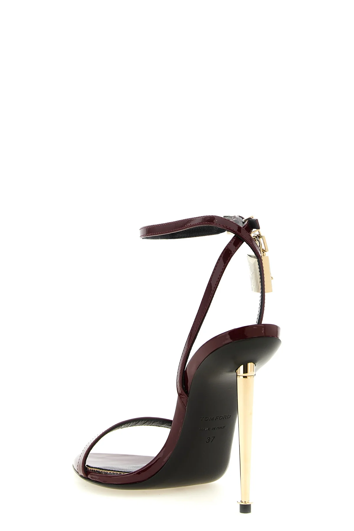 tom fords the padlock sandals define a bold silhouette through minimal constr