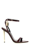 tom fords the padlock sandals define a bold silhouette through minimal constr