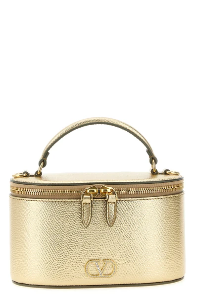 the valentino garavani vanity mini handbag in grenade calf leather stands out